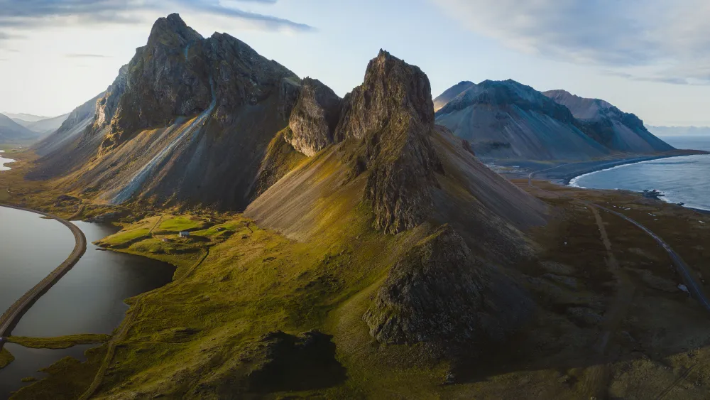 stagnation trotz erfolg? blogbild mit Berglandschaft und See